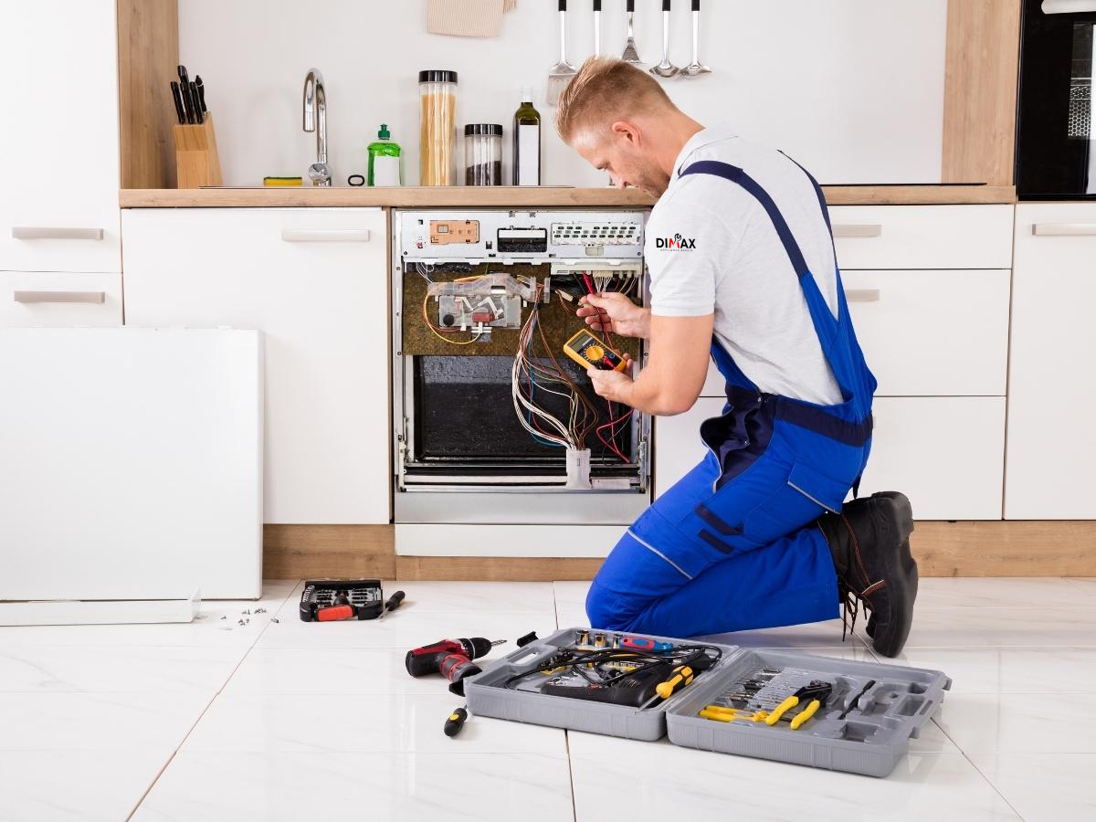 dishwasher repair man repairing appliances