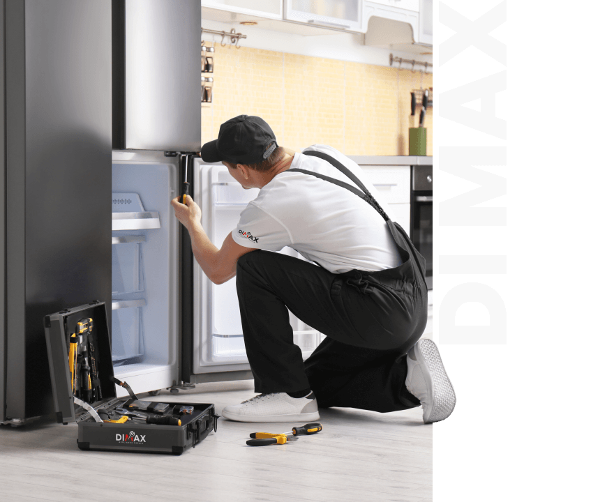 Dimax Appliance Repair Technician repairing Maytag Appliance